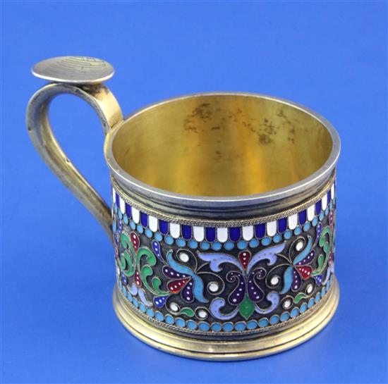 A late 19th century Russian 84 zolotnik silver gilt and cloisonne enamel cup by Khlebnikov, gross 5.5 oz.